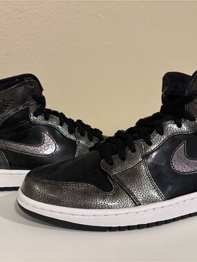 Jordan Men’s High-Top Sneakers in Black and Metallic Silver